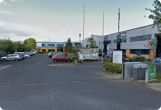 Street_view_image_of_a_parking_lot_featuring_several_parked_cars_ISM_Driving_Lessons