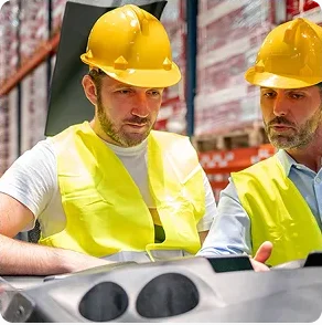 Two_men_wearing_hard_hats_ISM_Driving_Lessons