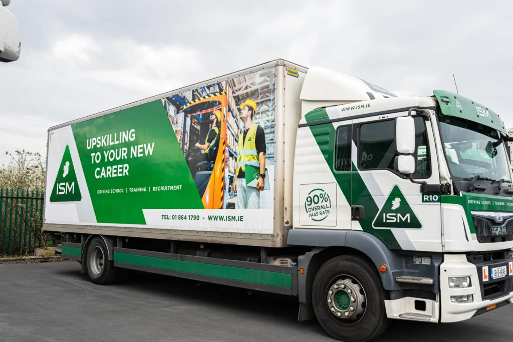 A_large_truck_featuring_a_ISM_logo_ISM_Driving_Lessons