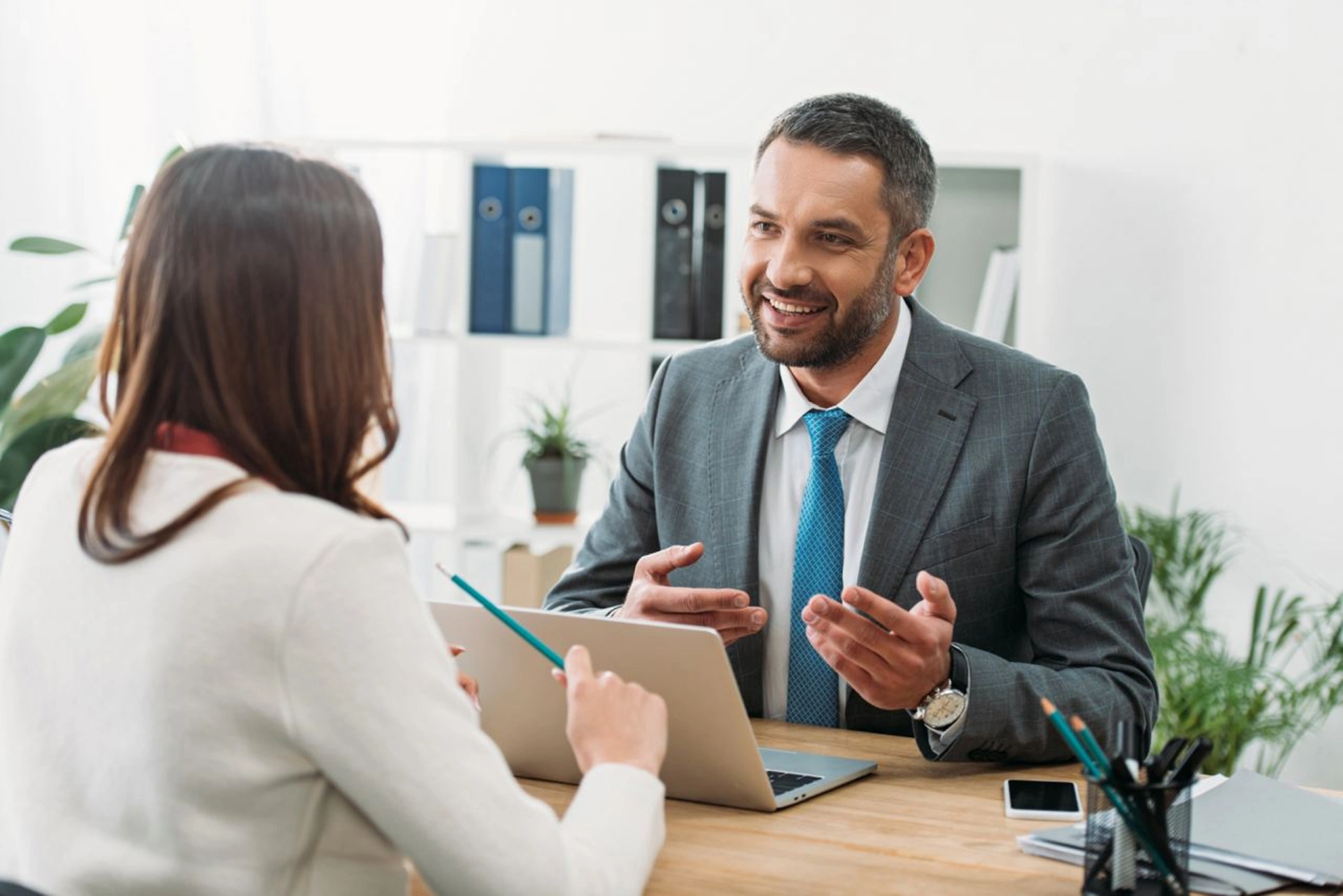 man_and_woman_in_business_attire-ISM